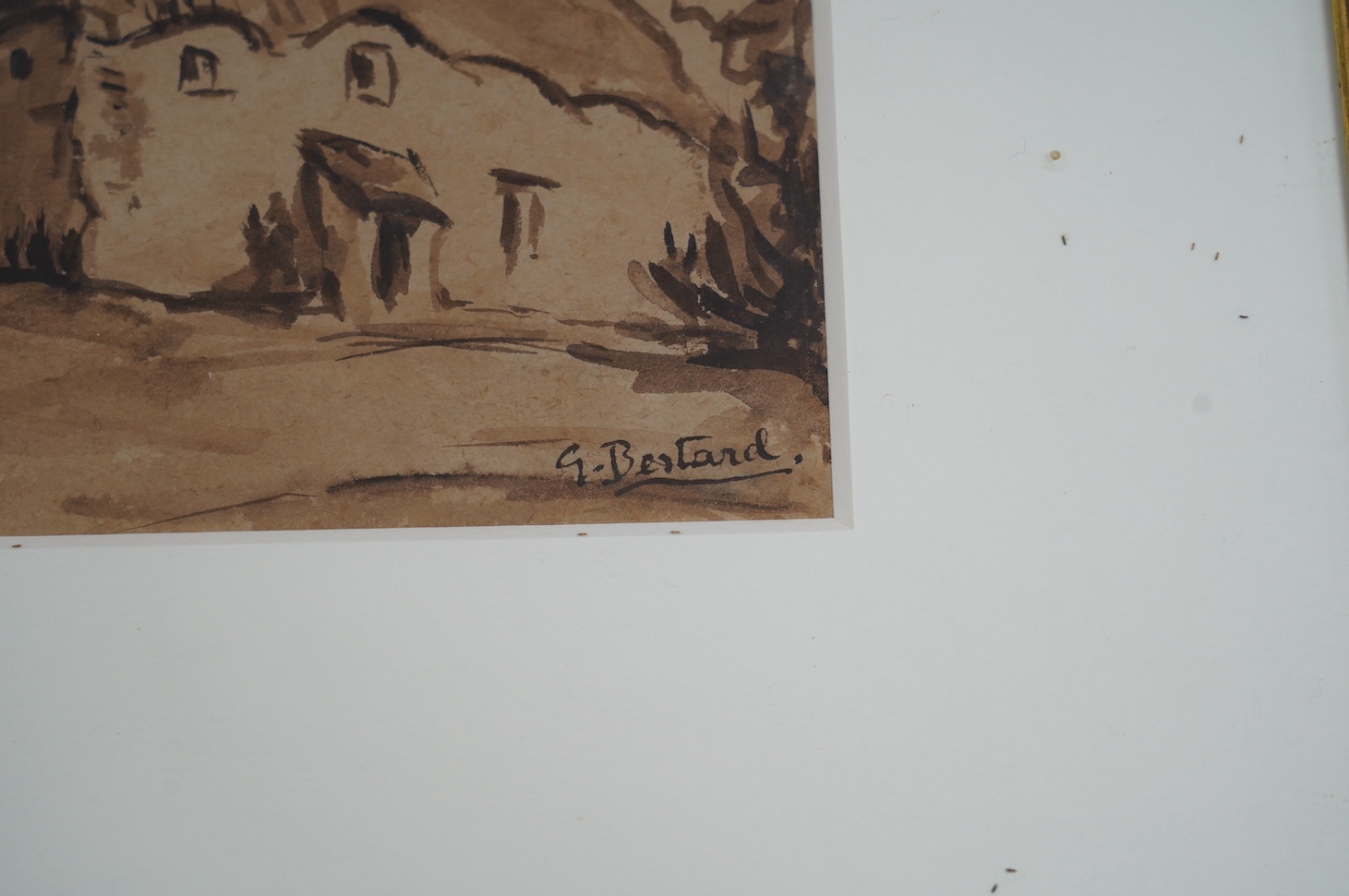 From the Studio of Fred Cuming. G. Bertrand, sepia watercolour, Study of a thatched cottage, signed, 13.5 x 18.5cm. Condition - fair, discolouration to the paper